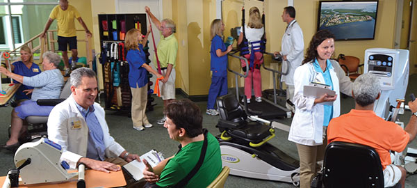 Doctors checking out old age people in the gym, Ft Myers, FL