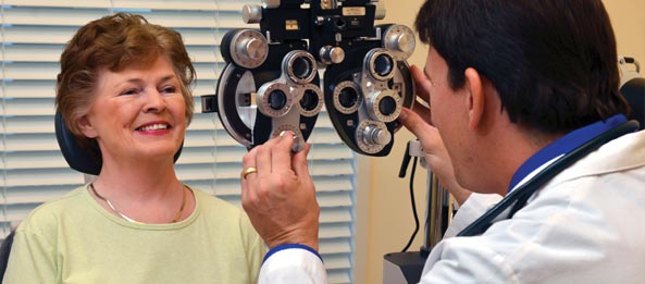 Doctor checking the patient for cataract problem, Ft Myers, FL