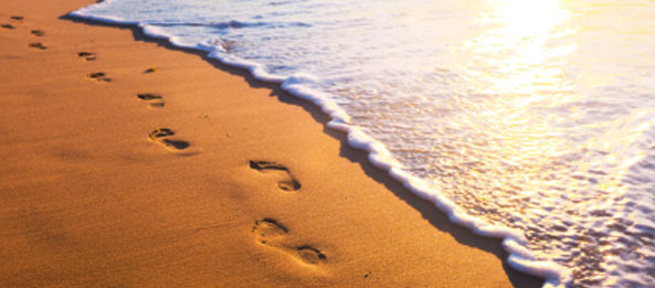 The beach with footsteps at Myers, FL