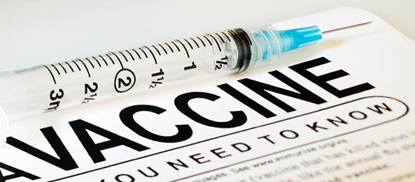 The poster of vaccine with syringe