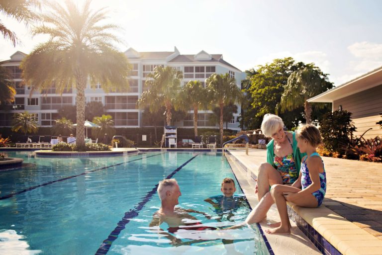 A family enjoying a day at the Aquatic Center on The Island